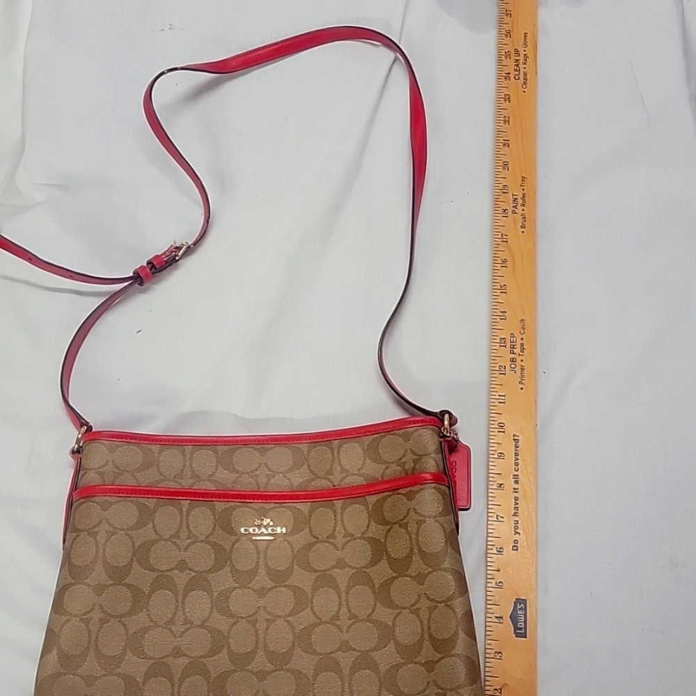Coach tan and pink cross body